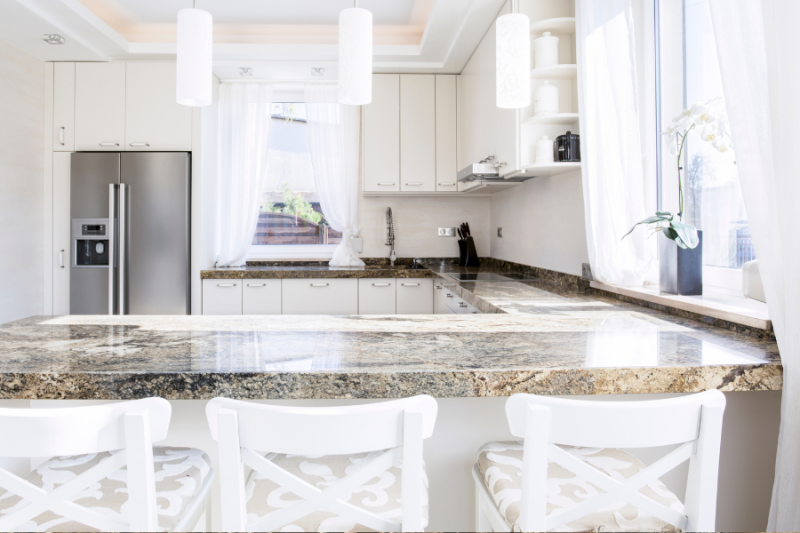 Le plan de travail en granit : Pourquoi est-il un choix idéal pour la rénovation de votre cuisine IXINA ?